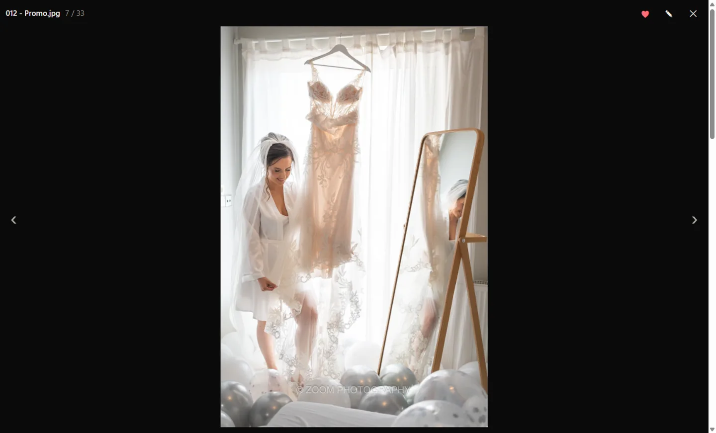 Galerie client : le client marque une favorite et laisse une note sur une photo de mariage